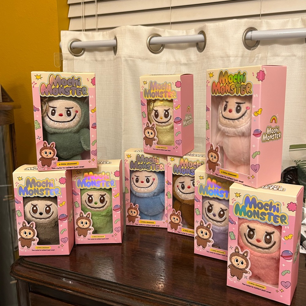 Bundle of 9 Mochi Monster Plush Monster Charms 9 Different Colors New In Package